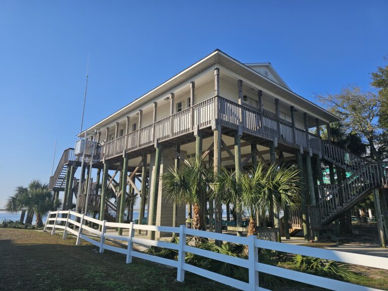 Clean elevated coastal building exterior after pressure washing in Crawfordville, FL