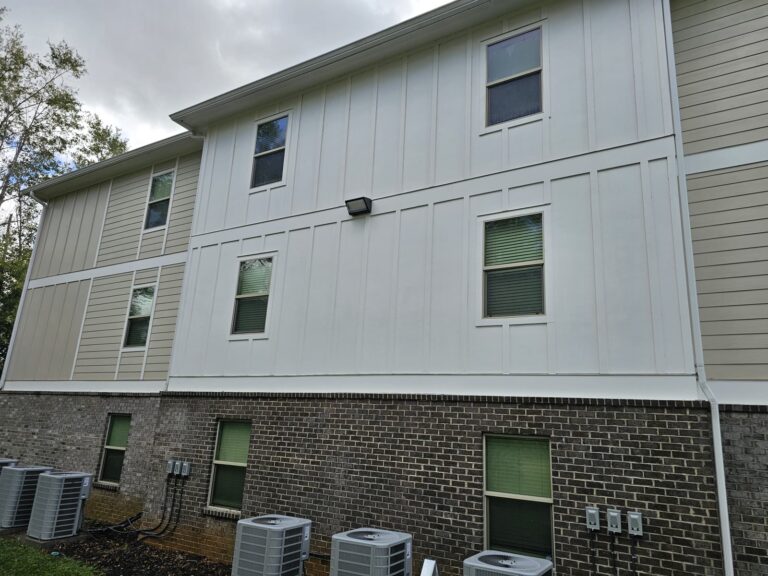 Clean multi-story building siding after soft washing in Tallahassee, FL
