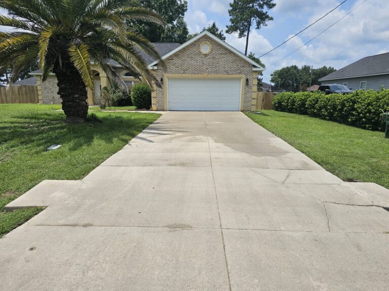 Clean concrete driveway after pressure washing in Midway, FL