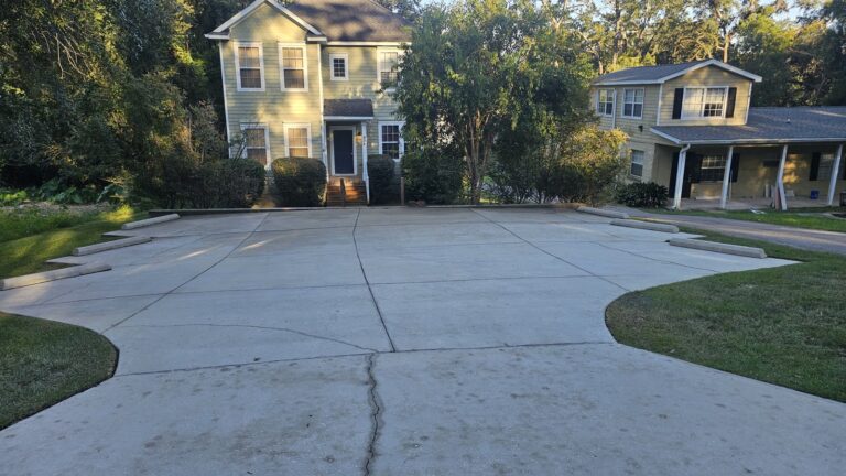 Clean concrete driveway after pressure washing