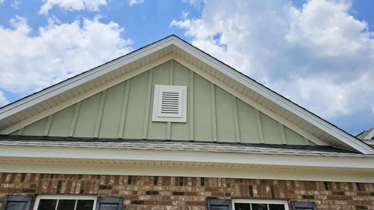 Clean gable siding and gutters after soft washing in Crawfordville, FL