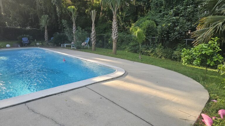 Clean concrete pool deck after pressure washing in Tallahassee, FL