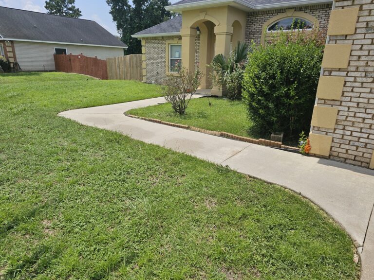 Sidewalk-Patio Cleaning 5 Clean concrete walkway after pressure washing at home in Midway, FL