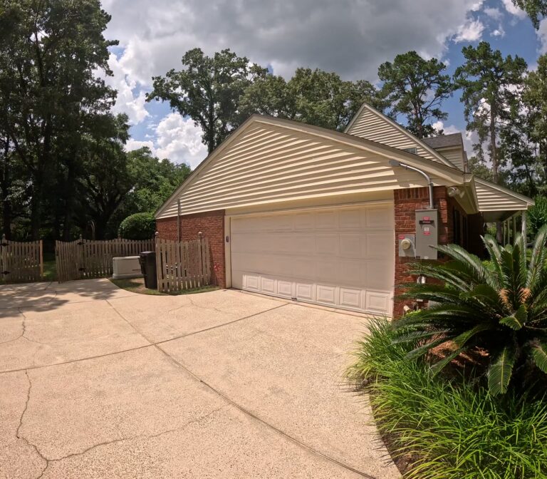 Clean driveway and garage after pressure washing in Ox Bottom Manor, Tallahassee, FL