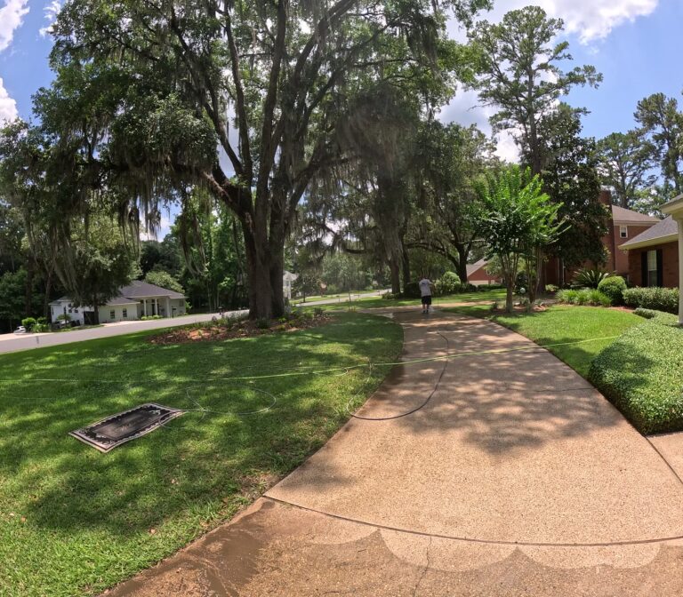 Clean sidewalk after surface cleaning in Ox Bottom Manor, Tallahassee, FL