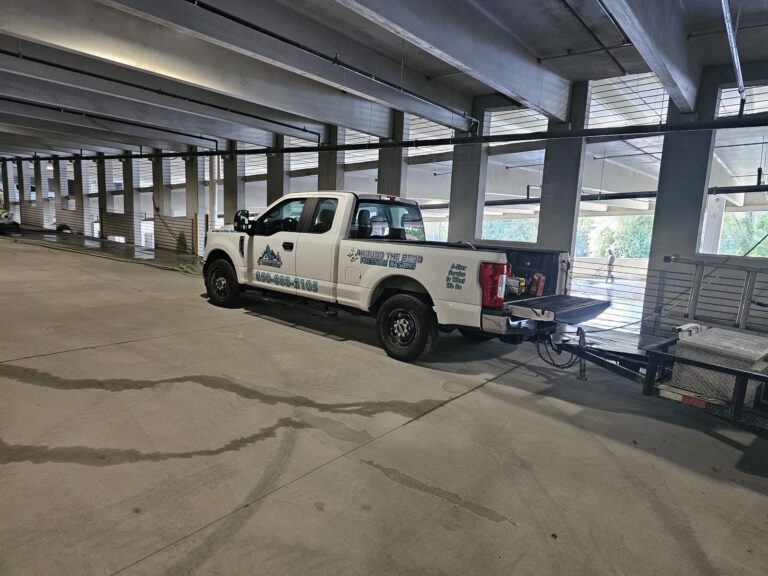 Around The Bend truck and equipment inside a new parking garage in Tallahassee, FL