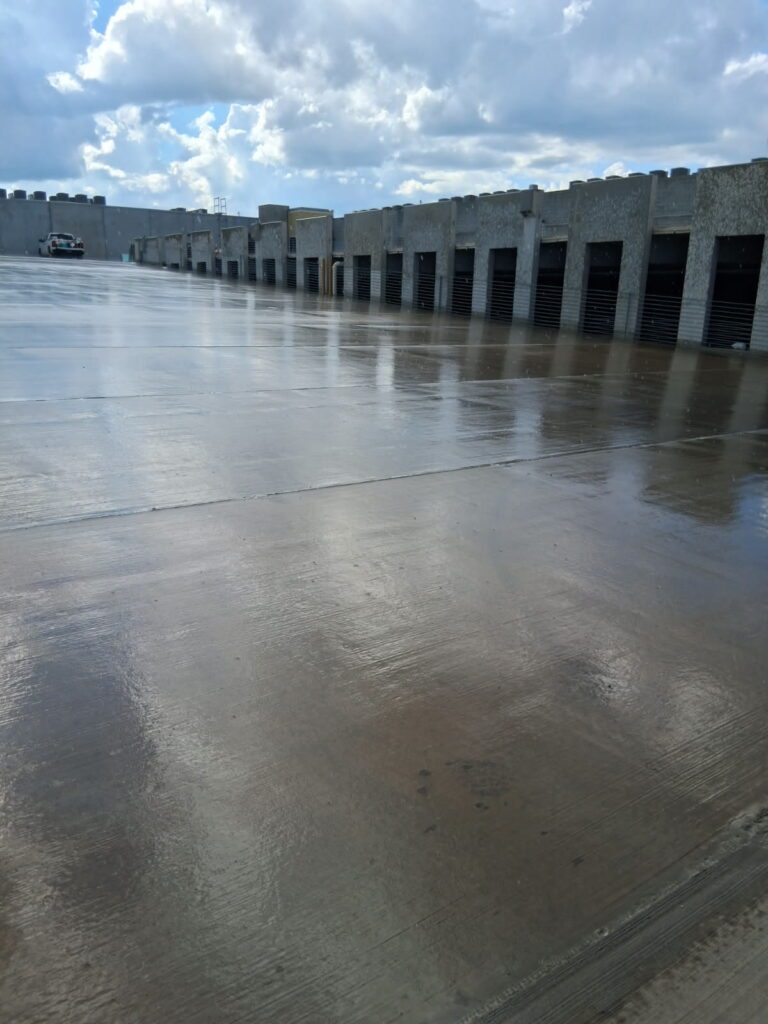 Freshly cleaned parking garage deck on a new construction project in Tallahassee, FL